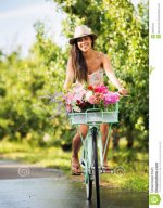 beautiful-girl-bike-countryside-summer-lifestyle-32997243.jpg