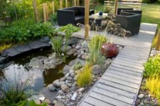 A-beautiful-small-pond-and-a-patio-with-a-sitting-area.jpg