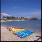 The colorful canoes on the beach.jpg